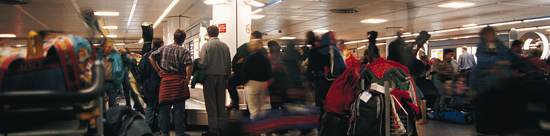 photo of people waiting on baggage