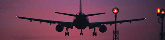 jet landing at dusk